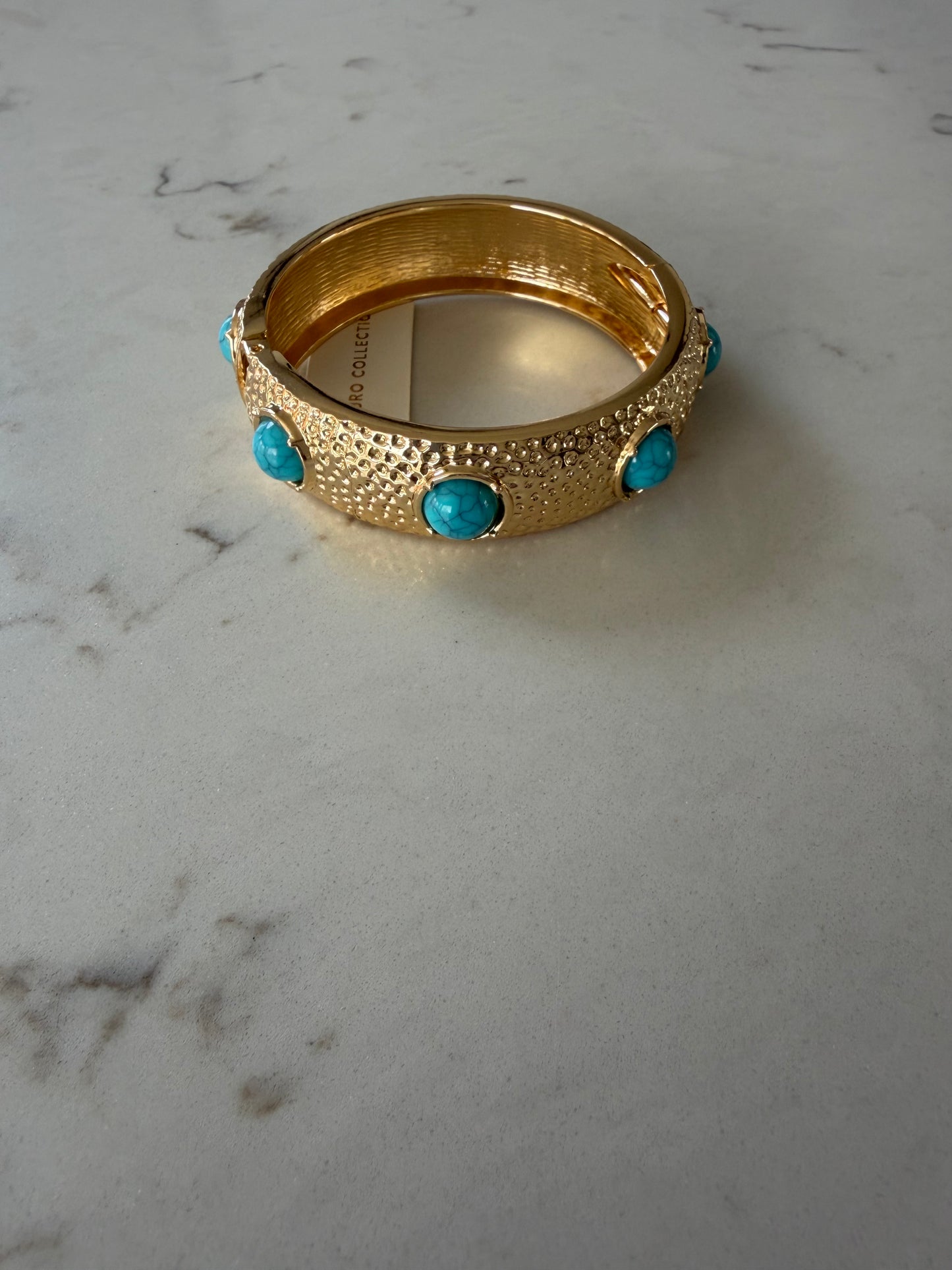 Round We Go Gold Bangle